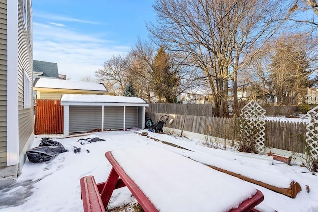 view of yard layered in snow