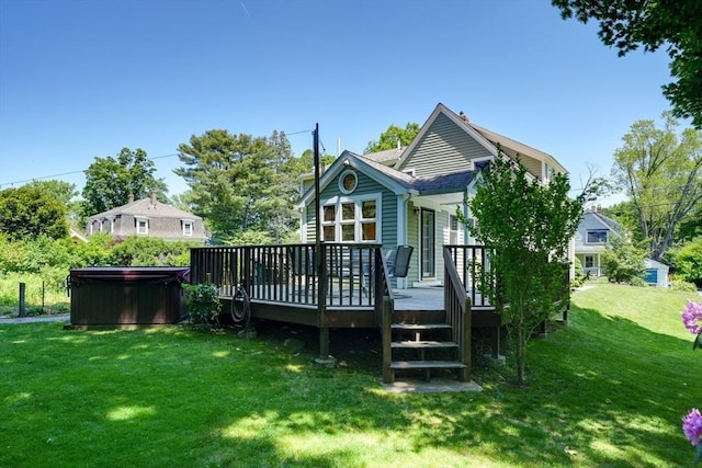 21 Mechanic St, Holliston, MA 01746 - rear view of property with a hot tub, a deck, and a lawn