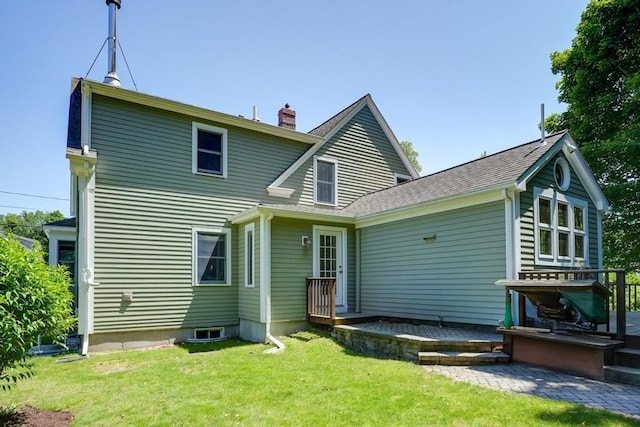 21 Mechanic St, Holliston, MA 01746 - rear view of house with a chimney, a lawn, and roof with shingles