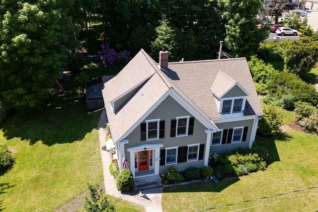 21 Mechanic St, Holliston, MA 01746 - view of front of home featuring a front yard, a chimney, and a shingled roof