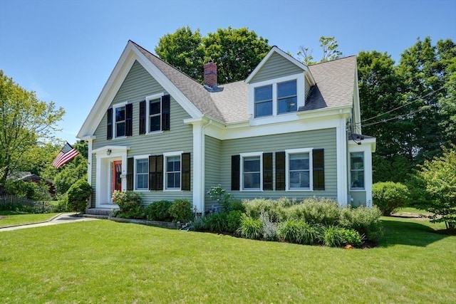 21 Mechanic St, Holliston, MA 01746 - view of front of house featuring a chimney, a front lawn, and a shingled roof