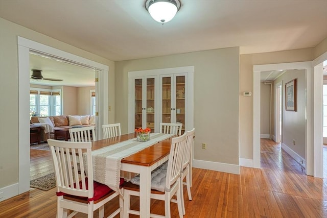 21 Mechanic St, Holliston, MA 01746 - dining space featuring light wood-style flooring and baseboards