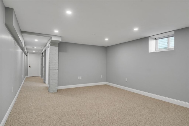 basement with light colored carpet