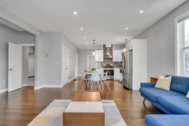 living room with dark wood-type flooring