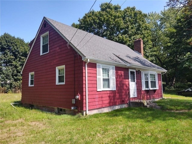 exterior space with a lawn