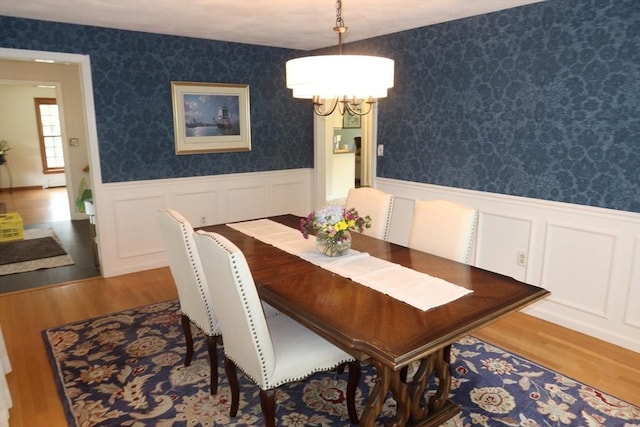 12 Hampton Ct, Walpole, MA 02032 - dining area featuring a chandelier, wainscoting, wood finished floors, and wallpapered walls