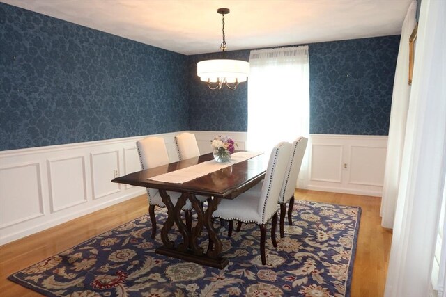 12 Hampton Ct, Walpole, MA 02032 - dining area featuring a chandelier, wallpapered walls, wainscoting, and light wood-type flooring