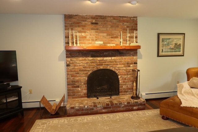 12 Hampton Ct, Walpole, MA 02032 - living room featuring baseboard heating, wood finished floors, and a brick fireplace
