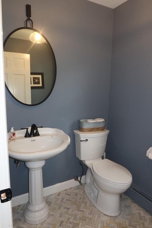 12 Hampton Ct, Walpole, MA 02032 - bathroom with a baseboard radiator, toilet, and baseboards