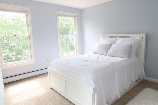 12 Hampton Ct, Walpole, MA 02032 - bedroom featuring a baseboard radiator, light colored carpet, and baseboards