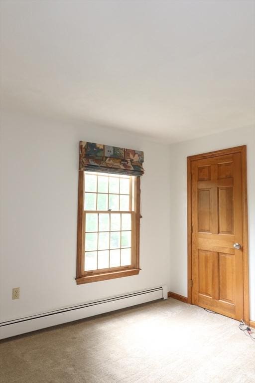 12 Hampton Ct, Walpole, MA 02032 - unfurnished room with a baseboard heating unit, light carpet, and baseboards
