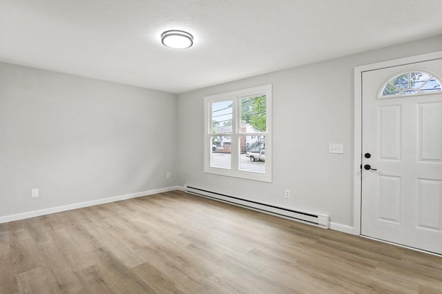 18 Nanita St, Worcester, MA 01604 - entrance foyer with a baseboard radiator and light wood-style flooring
