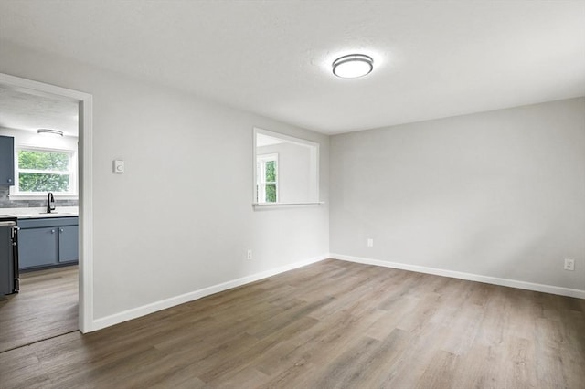 18 Nanita St, Worcester, MA 01604 - unfurnished room with wood finished floors and baseboards