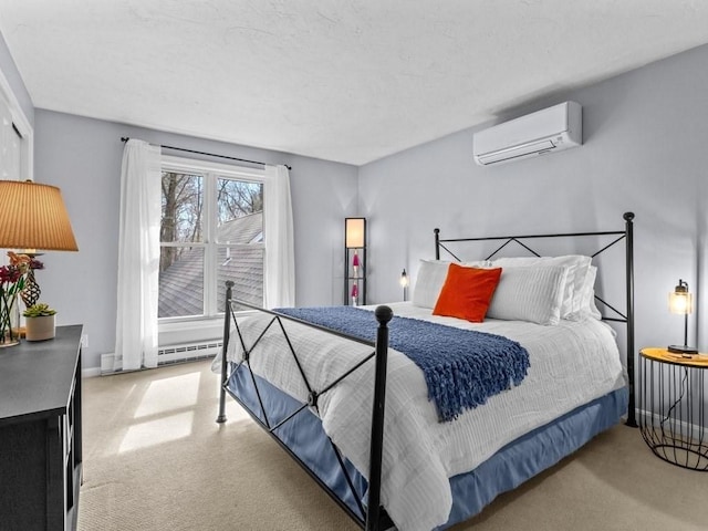 bedroom with an AC wall unit, baseboards, and light carpet