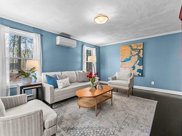 living area with baseboards, ornamental molding, a textured ceiling, a wall mounted AC, and wood-type flooring