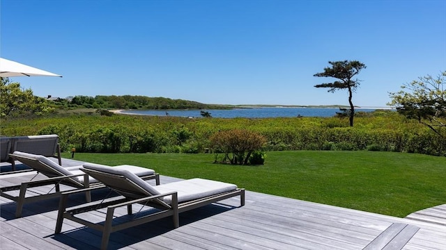 61 Butlers Cove Rd, Edgartown, MA 02539 - wooden terrace with a water view and a yard