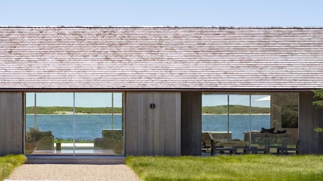 61 Butlers Cove Rd, Edgartown, MA 02539 - view of side of home featuring a water view