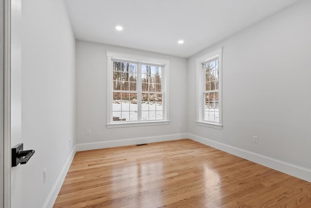 empty room featuring light hardwood / wood-style floors