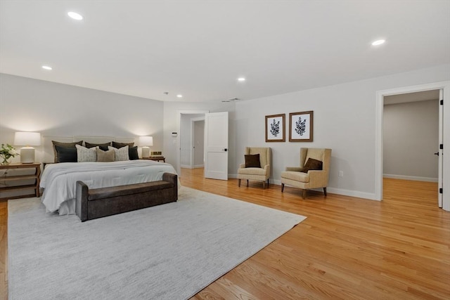 bedroom with light hardwood / wood-style flooring