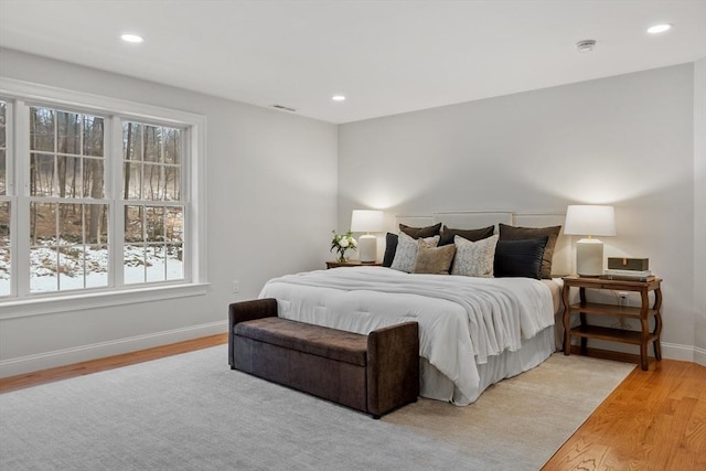 bedroom with light wood-type flooring