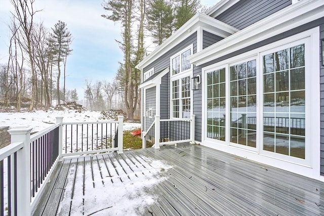 view of snow covered deck