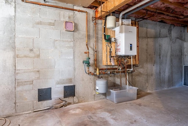 utility room featuring water heater