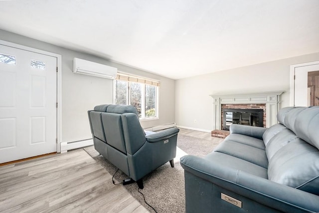 living area with light wood-type flooring, a fireplace, baseboard heating, and a wall mounted AC