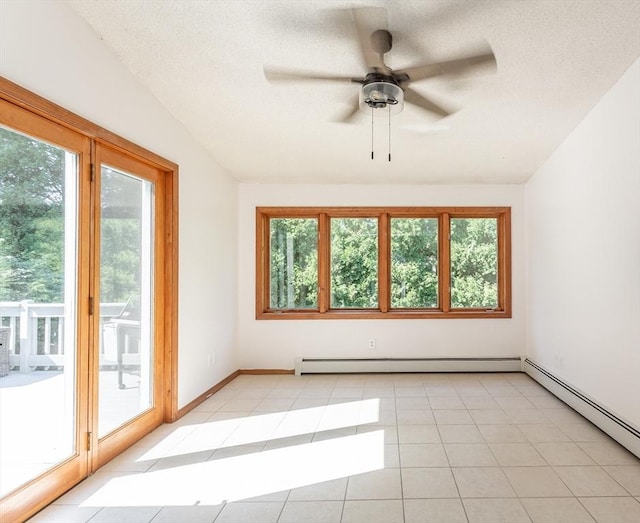 168 Varao Ave, Somerset, MA 02726 - spare room featuring healthy amount of natural light, a baseboard radiator, vaulted ceiling, ceiling fan, and a textured ceiling