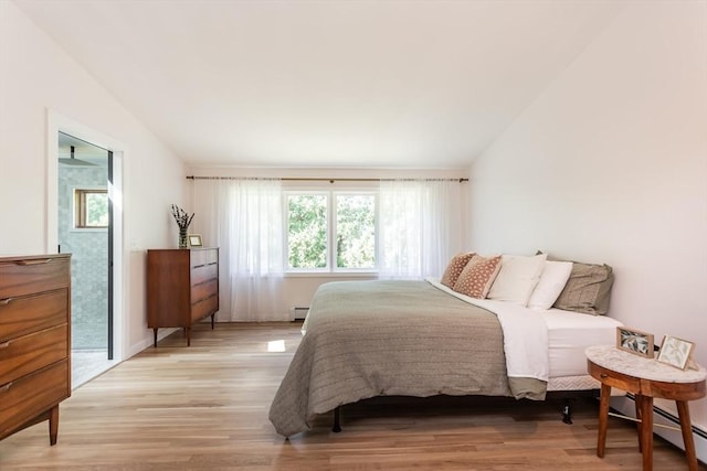 168 Varao Ave, Somerset, MA 02726 - bedroom with multiple windows, baseboard heating, and light wood-style flooring