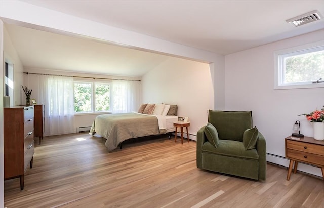168 Varao Ave, Somerset, MA 02726 - bedroom with a baseboard heating unit, light wood finished floors, and a baseboard radiator