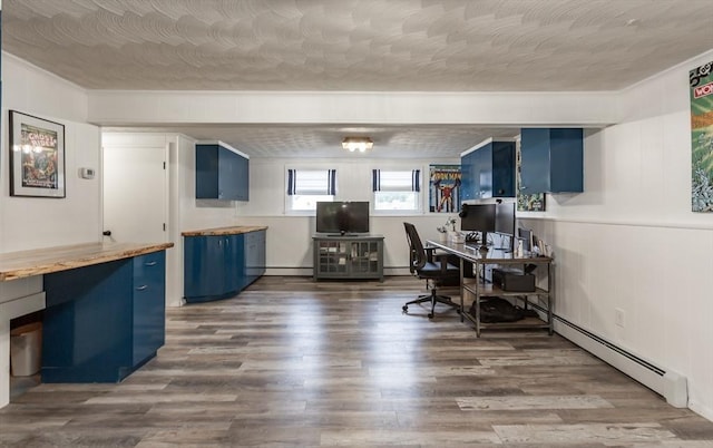 168 Varao Ave, Somerset, MA 02726 - office with wood finished floors, a baseboard heating unit, and baseboard heating