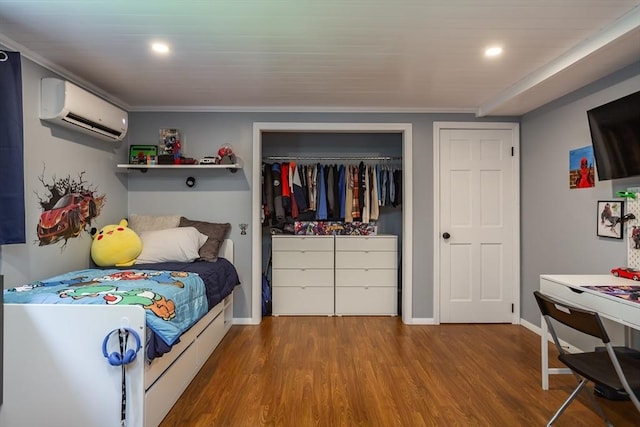 168 Varao Ave, Somerset, MA 02726 - bedroom featuring a wall mounted AC, wood finished floors, ornamental molding, recessed lighting, and a closet