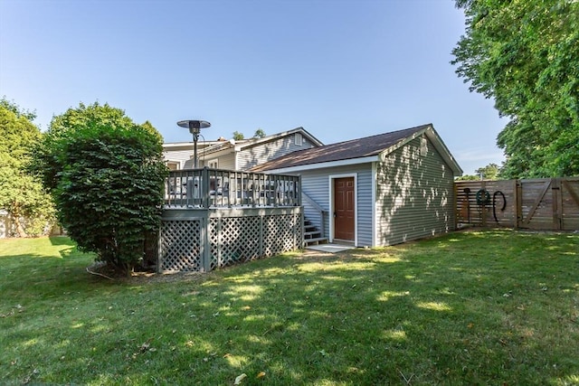 168 Varao Ave, Somerset, MA 02726 - rear view of property featuring a deck, an outdoor structure, and a gate