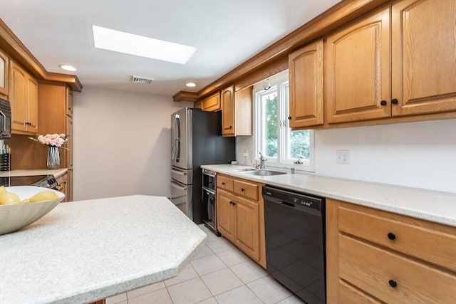168 Varao Ave, Somerset, MA 02726 - kitchen featuring dishwasher, a skylight, light countertops, and recessed lighting