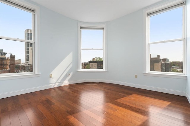 416 Marlborough Unit 608, Boston, MA 02116 - spare room featuring hardwood / wood-style floors and baseboards