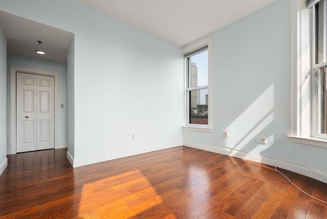416 Marlborough Unit 608, Boston, MA 02116 - spare room featuring baseboards and wood-type flooring