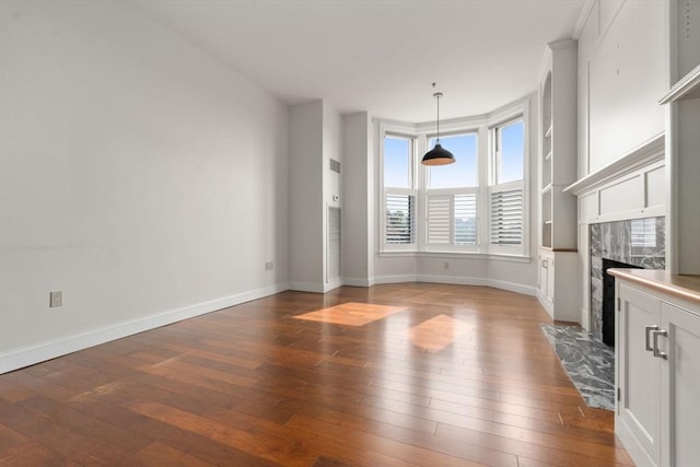 416 Marlborough Unit 608, Boston, MA 02116 - unfurnished dining area featuring a fireplace and wood-type flooring