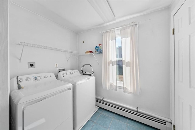 washroom with washer and dryer, a baseboard radiator, laundry area, and plenty of natural light