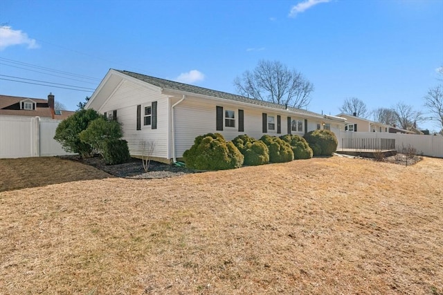 view of front of house featuring a fenced backyard