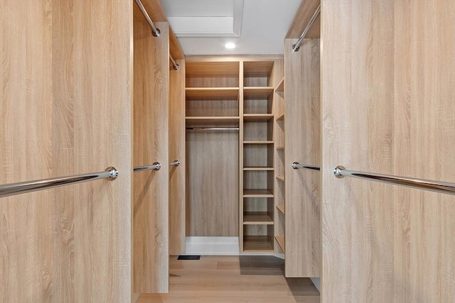 walk in closet featuring light wood-type flooring