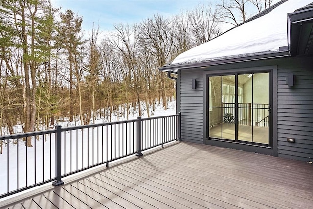 view of snow covered deck