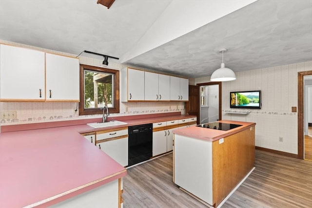 3 Meadow Way, Norton, MA 02766 - kitchen featuring black appliances, a sink, light wood-style flooring, white cabinets, and a kitchen island