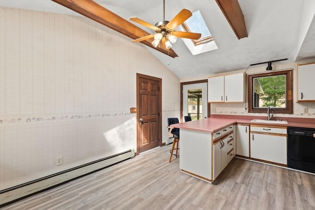 3 Meadow Way, Norton, MA 02766 - kitchen featuring black dishwasher, a sink, a skylight, a baseboard radiator, and a peninsula