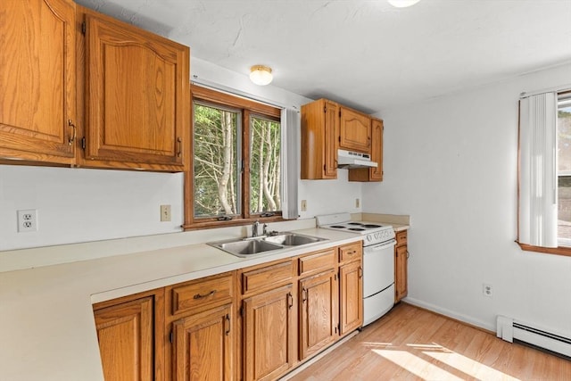 3 Meadow Way, Norton, MA 02766 - kitchen featuring white electric range oven, a baseboard heating unit, under cabinet range hood, a sink, and light countertops