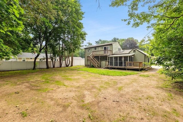 3 Meadow Way, Norton, MA 02766 - view of yard featuring a sunroom, a wooden deck, and stairs
