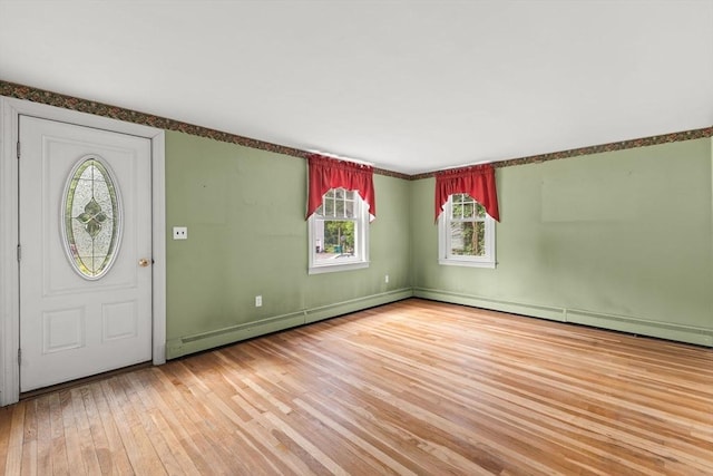3 Meadow Way, Norton, MA 02766 - foyer entrance with light wood-style floors, plenty of natural light, a baseboard radiator, and baseboards
