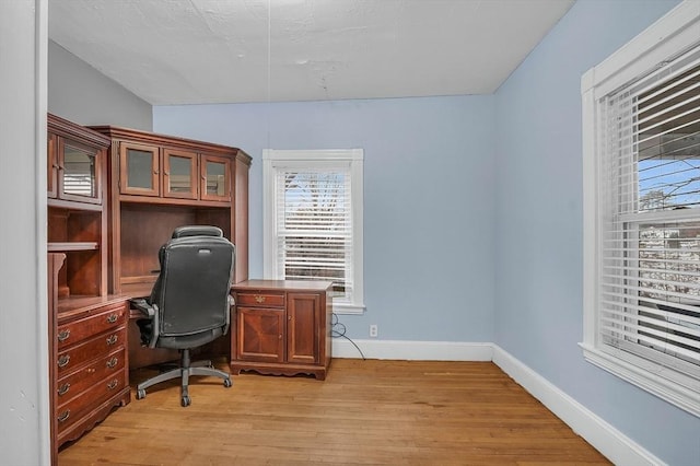 office area with light wood-type flooring