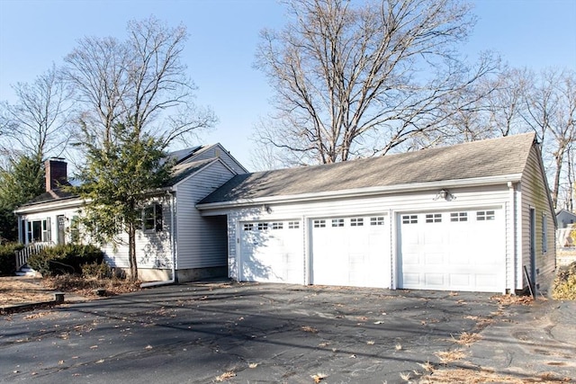 exterior space with a garage