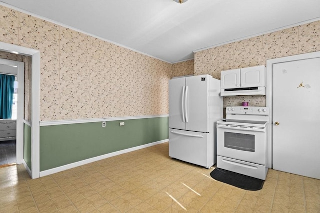 kitchen with white appliances, wallpapered walls, ornamental molding, light floors, and under cabinet range hood