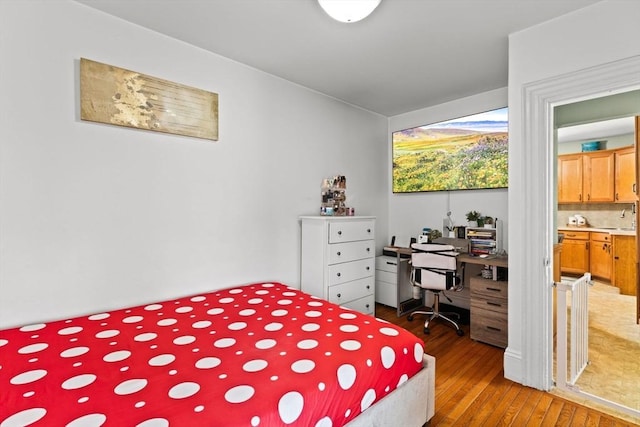 bedroom with wood-type flooring